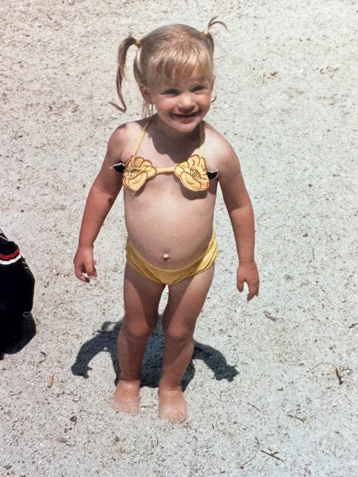 Megan as a child — the inner child this work is built for